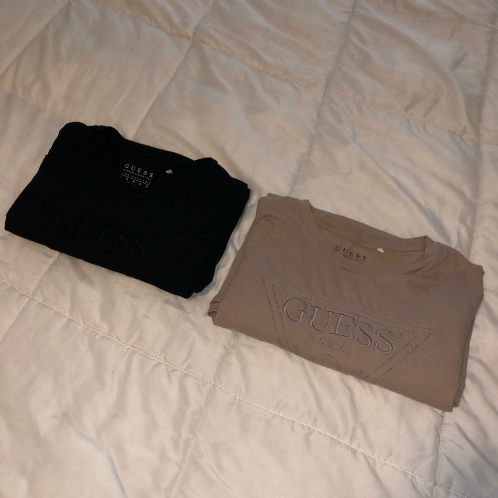 Two Men’s Guess t shirts